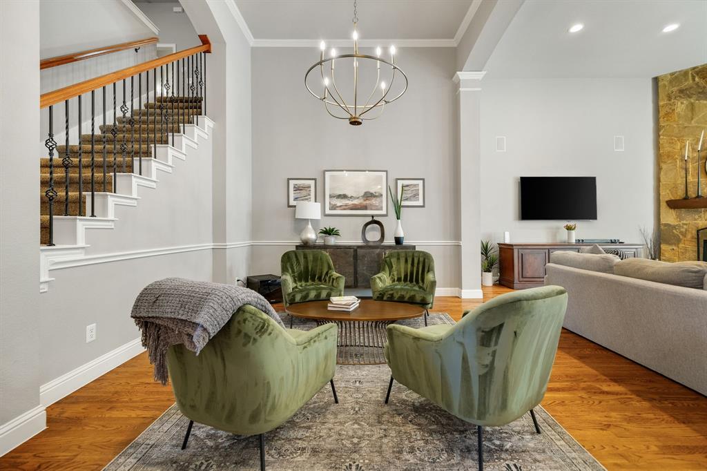 Currently set as a sitting area, this is a great space for your beautiful dining table as well. Currently set as a sitting area, this is a great space for your beautiful dining table as well.