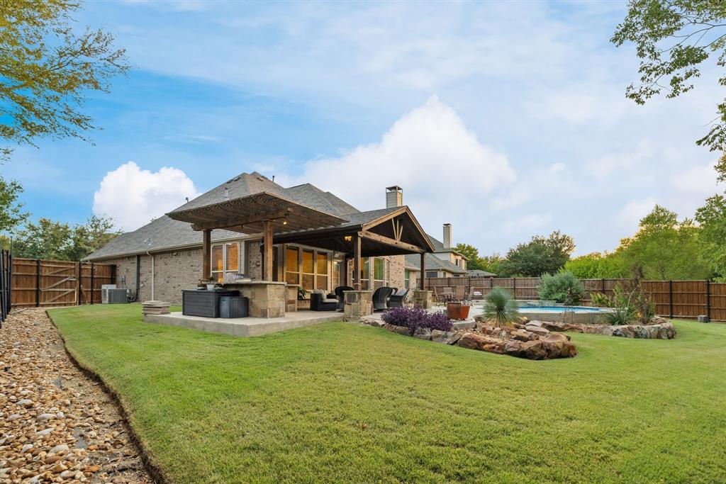 Pool, patio and grill, and still lots of grass area for play!