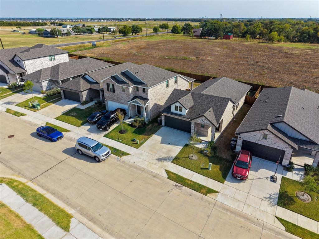 Modern residential architecture with varied rooflines and a concrete driveway