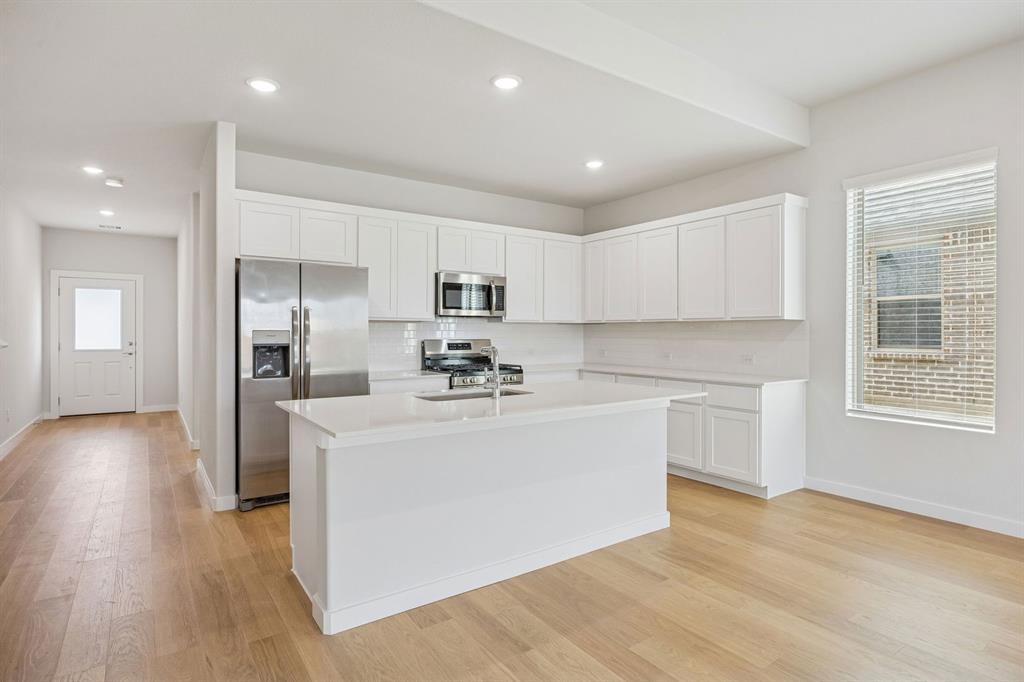 Kitchen in the Stanley II home plan – REPRESENTATIVE PHOTO Kitchen in the Stanley II home plan – REPRESENTATIVE PHOTO