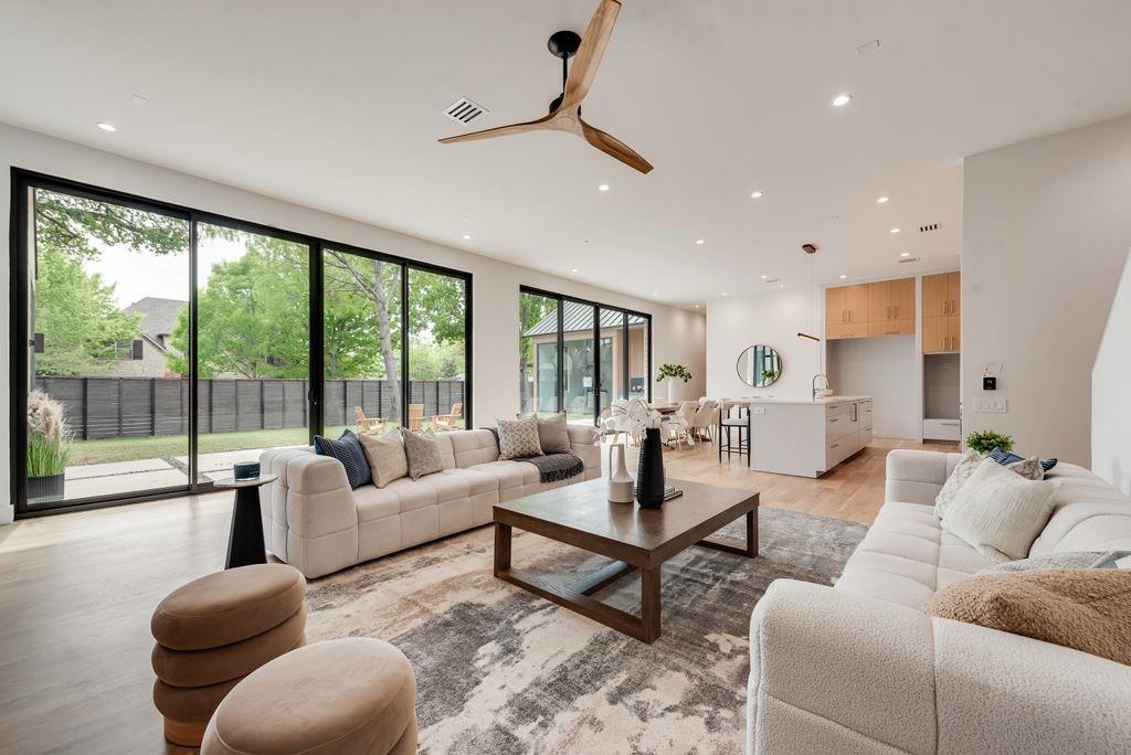 Expansive 10’ sliding glass doors create a seamless connection between indoor and outdoor living. Expansive 10’ sliding glass doors create a seamless connection between indoor and outdoor living.
