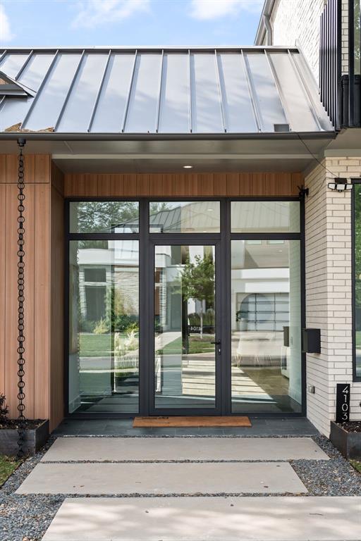 The covered entry welcomes you with clean lines and modern architectural detail. The covered entry welcomes you with clean lines and modern architectural detail.