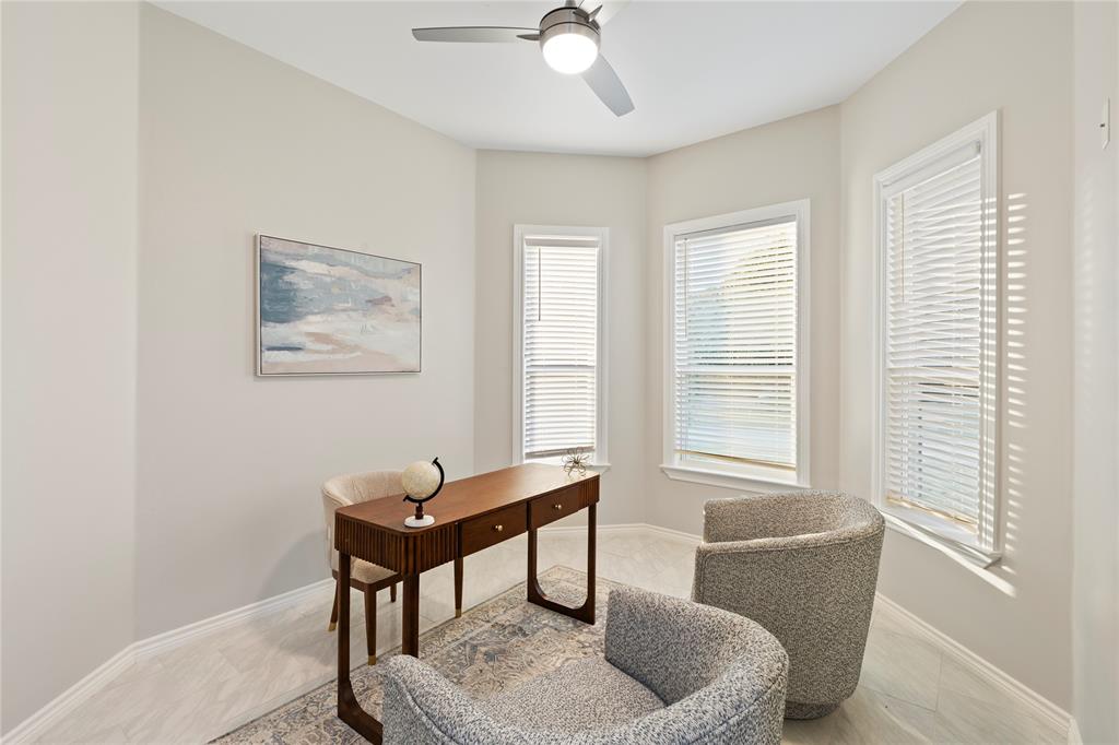Recessed lighting, ceiling fan, multiple windows with blinds, light wood-finish flooring, and light-toned walls Recessed lighting, ceiling fan, multiple windows with blinds, light wood-finish flooring, and light-toned walls