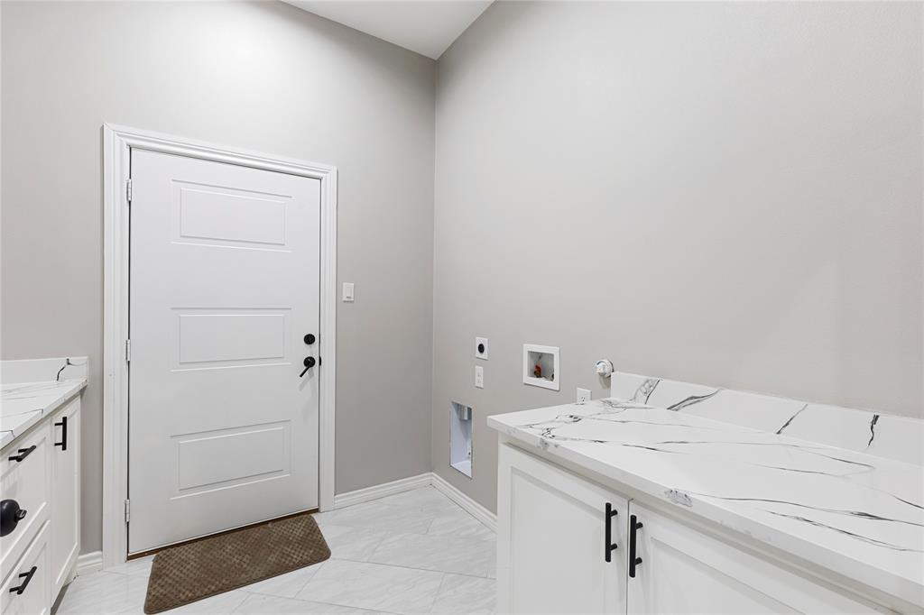 White paneled door with black hardware
