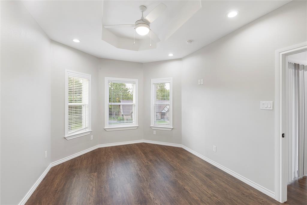 Recessed lighting, wood-finish flooring, and a ceiling fan with light fixture