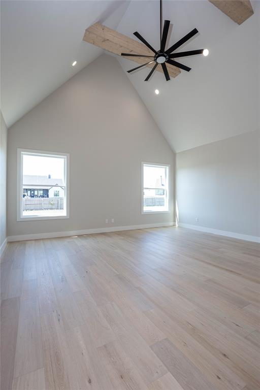 Large gameroom with vaulted ceilings, could be 5th bedroom.