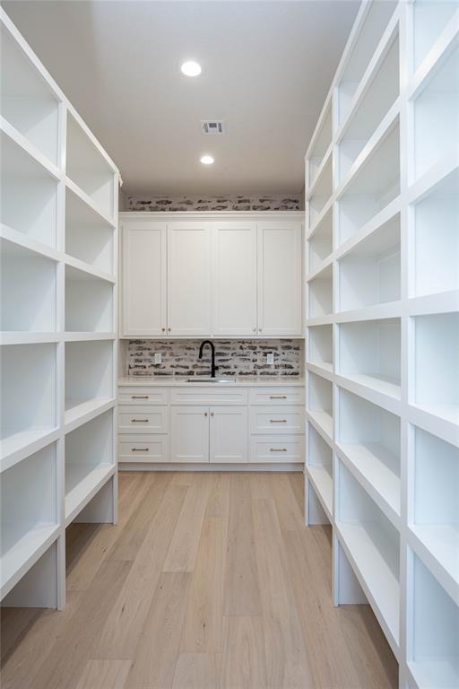 Walk-in pantry with tons of storage.