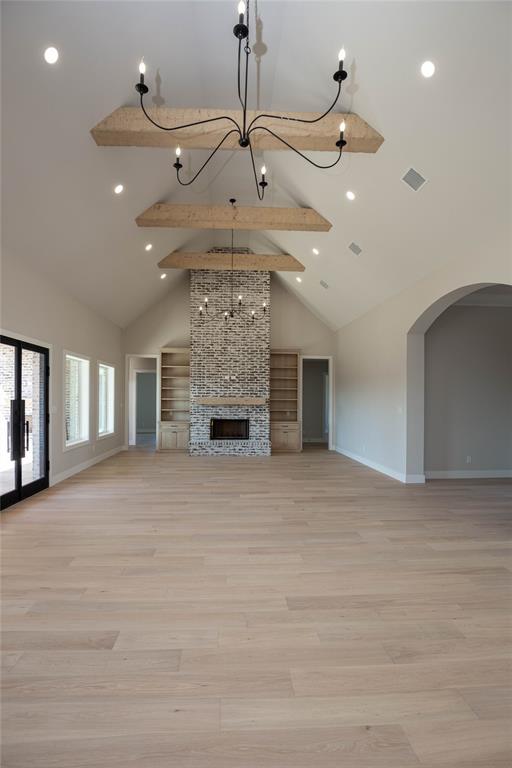 Vaulted ceilings with handscraped beams. Vaulted ceilings with handscraped beams.