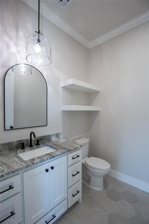Guest bathroom located close to the backdoor for outside use.