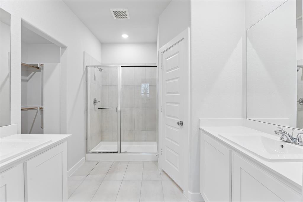 Primary Bathroom in the Cedar home plan – REPRESENTATIVE PHOTO