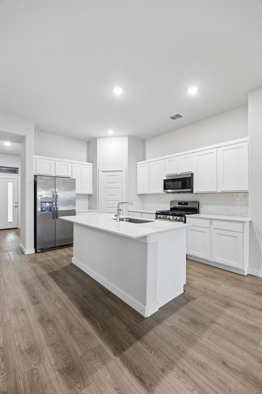 Kitchen in the Cedar home plan – REPRESENTATIVE PHOTO
