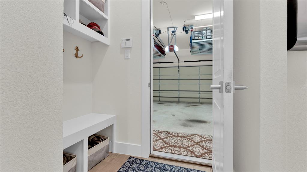 Floor 1: Mud Room. View of garage two motorized overhead storage lift systems.