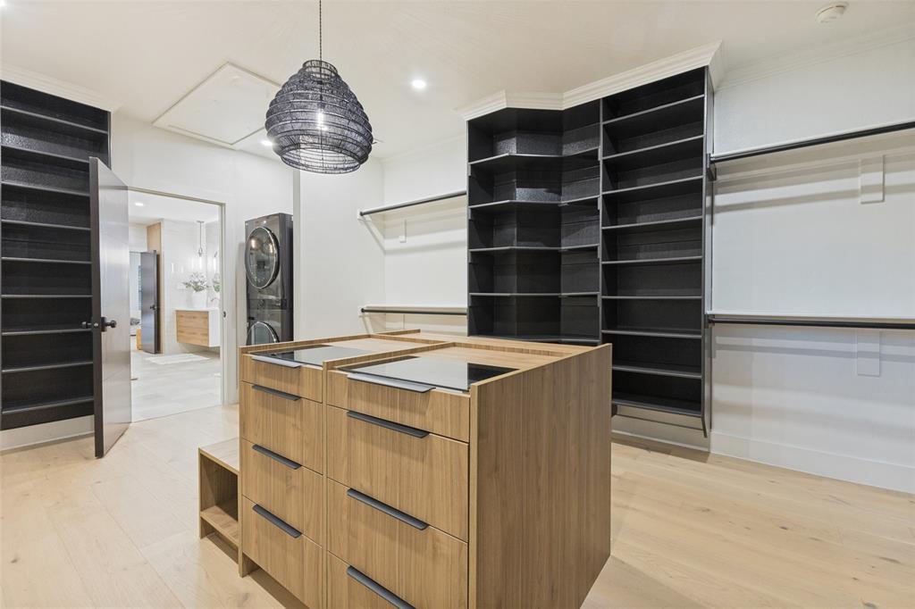 Primary closet with stackable with convenient stackable W/D