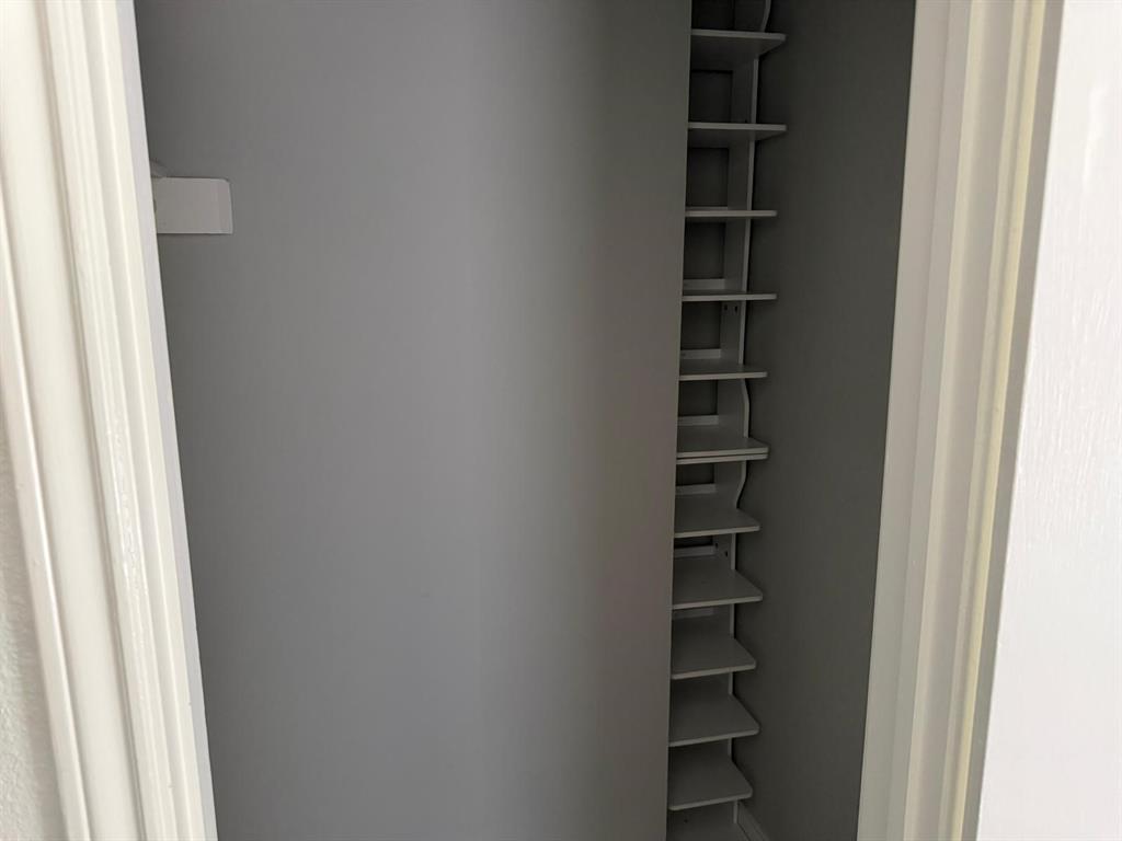 Built-in shelving with multiple storage tiers