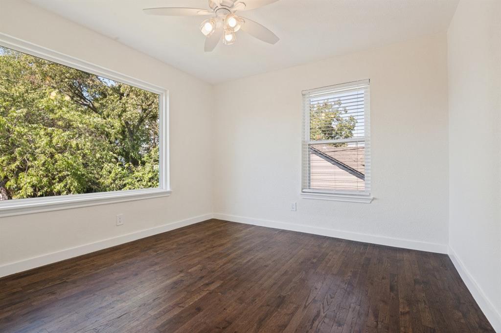 Secondary bedroom with custom oversized window