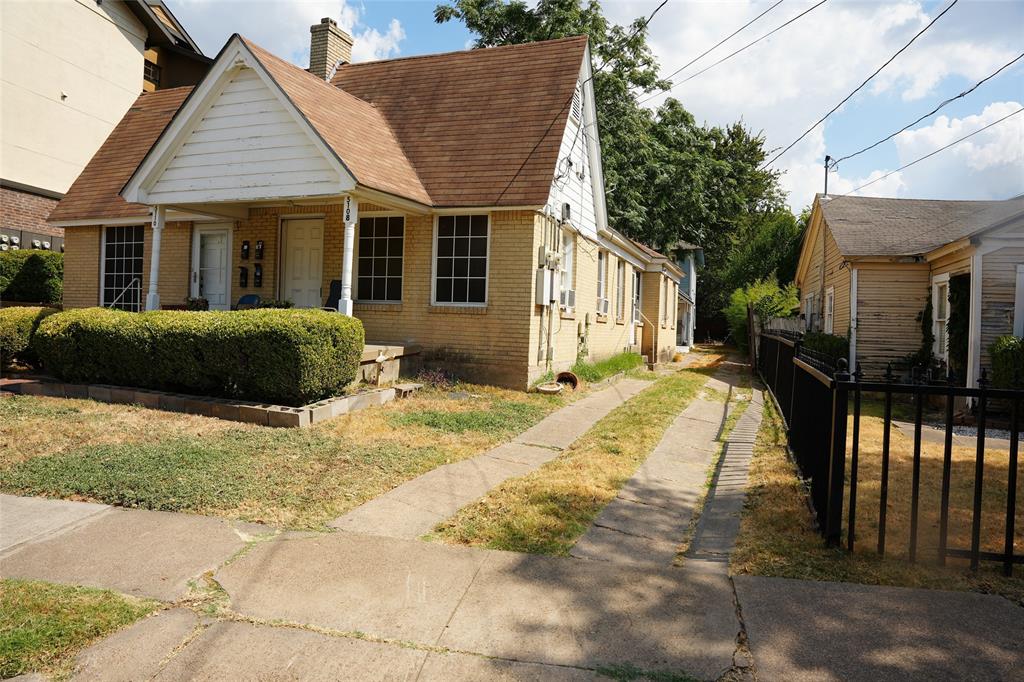 Front driveway and side approach along the west property boundary.