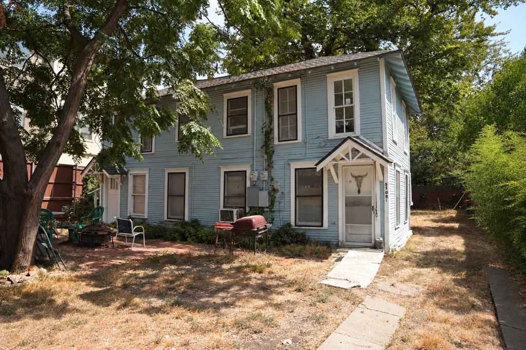 Front exterior elevation of the rear two-story duplex structure.