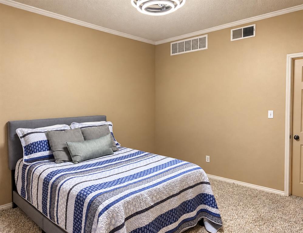 Textured carpeting throughout