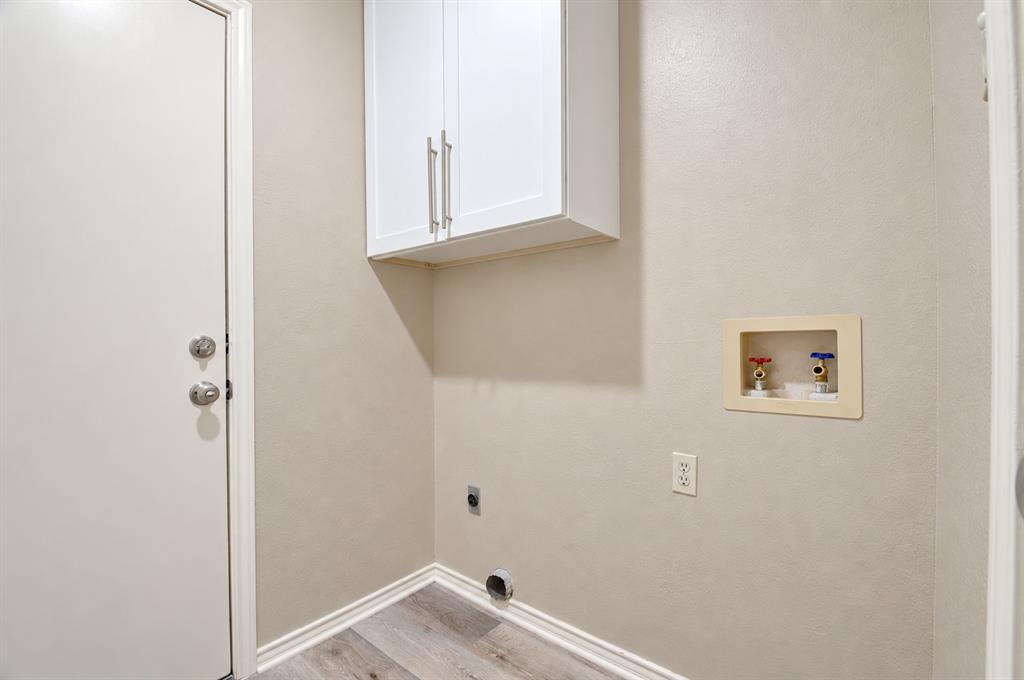 Laundry room with storage