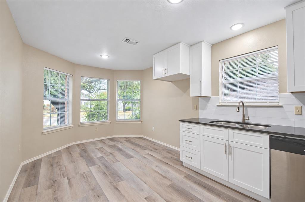 Kitchen with breakfast nook with tons of natural light