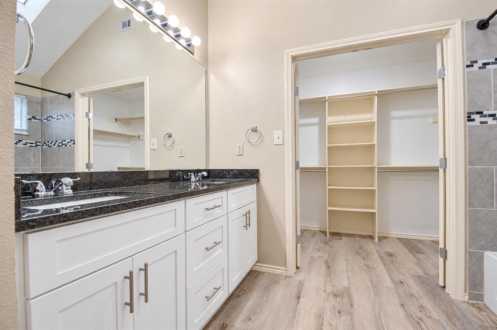 Master bath and closet with granite countertops