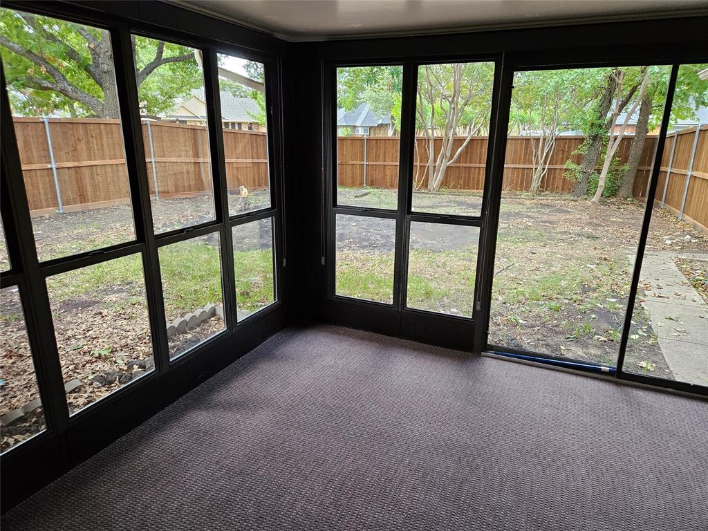 New custom roller shades in raised position