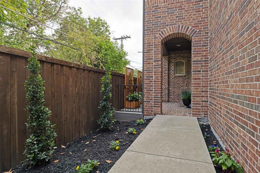Front walkway has new landscaping and gate
