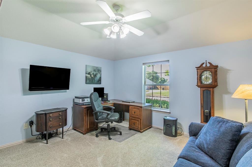 Fourth bedroom is being used as an office