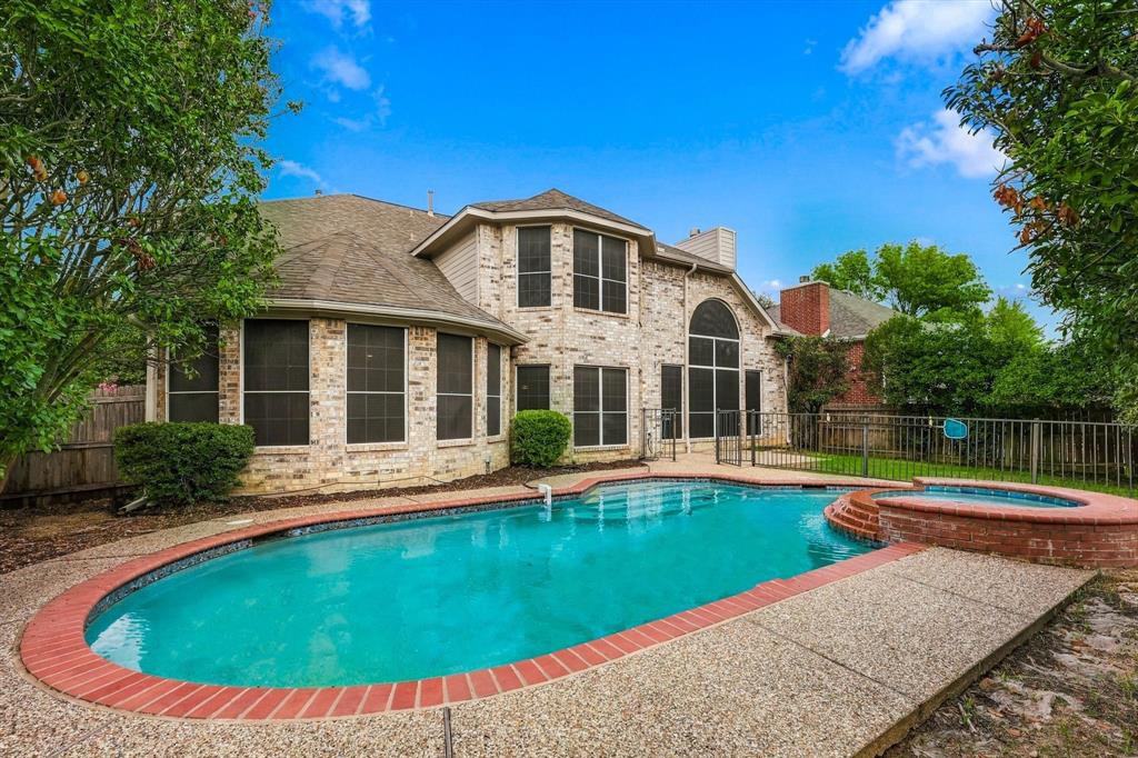 The impressive rear elevation pairs beautifully with the pool and spa, creating a standout outdoor retreat ideal for sunny afternoons, evening gatherings and everyday enjoyment.