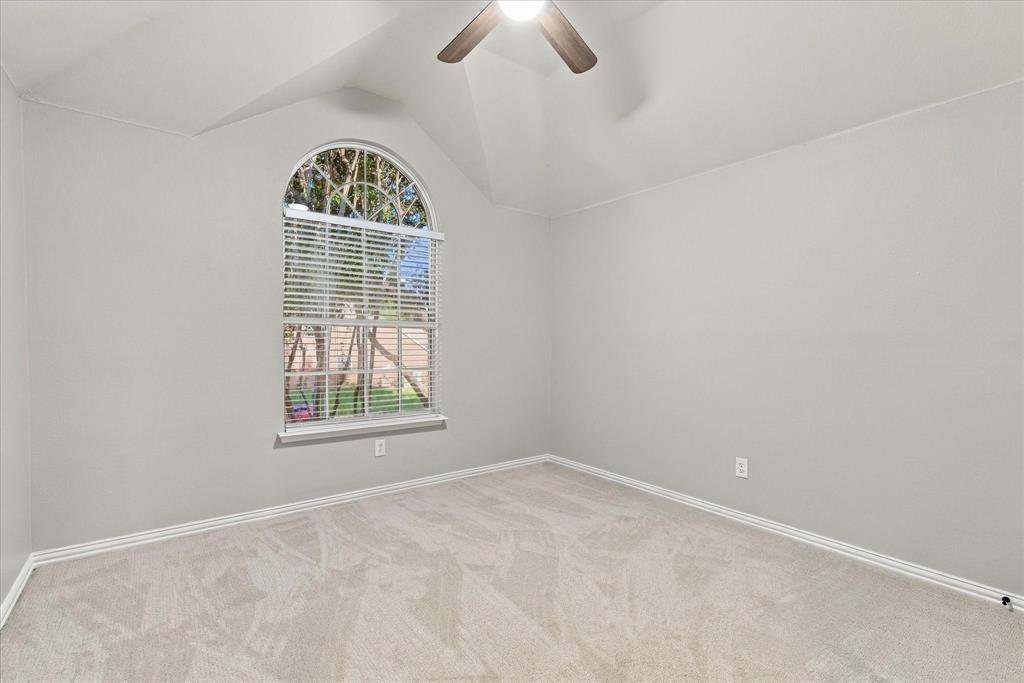A PEACEFUL PLACE TO UNWIND! Soft neutral tones, freshly painted, a graceful arched window, vaulted ceilings, and plush new carpeting create a bright, comfortable retreat with timeless appeal.