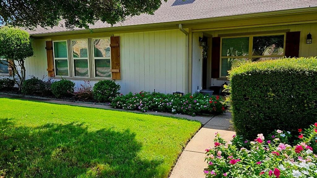 Landscaped with Sprinkler System