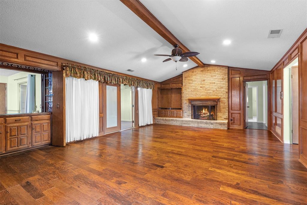 Living room featuring a private built-in wet bar