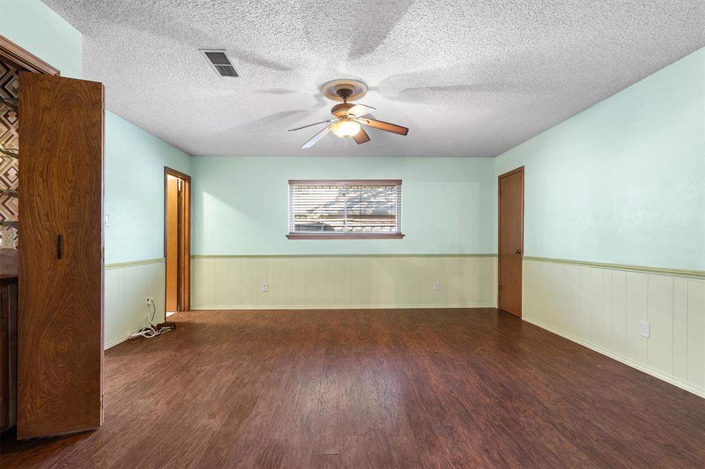 Huge flexible room to use for a guest bedroom or in-law suite with private access to a full bathroom.
