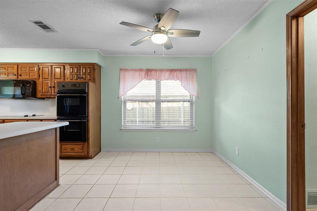 Sunlit breakfast nook adjacent to the kitchen