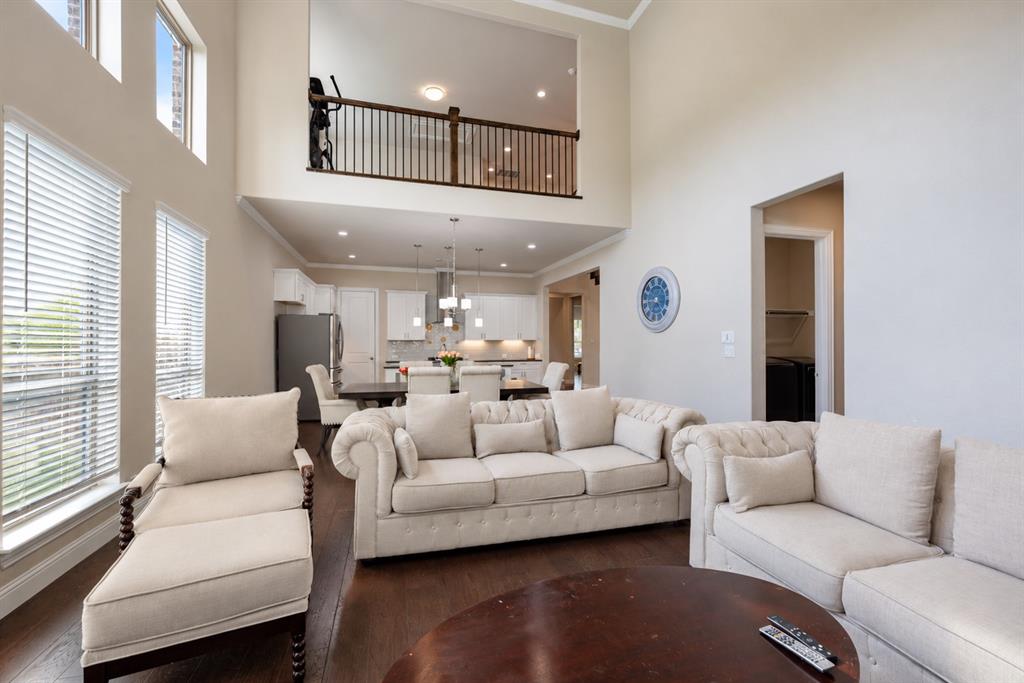Soaring ceilings with upper-level windows