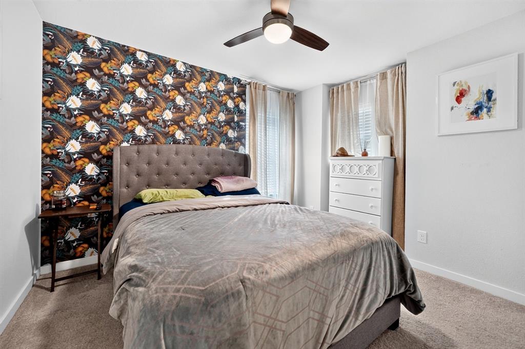 Accent wall featuring patterned wallpaper