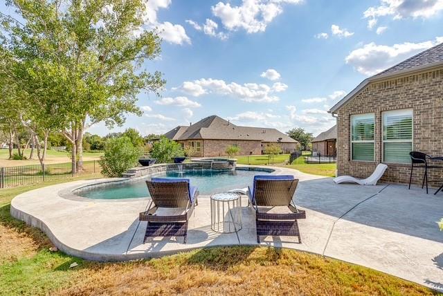 Salt water pool with spa, tanning ledge and fire bowls