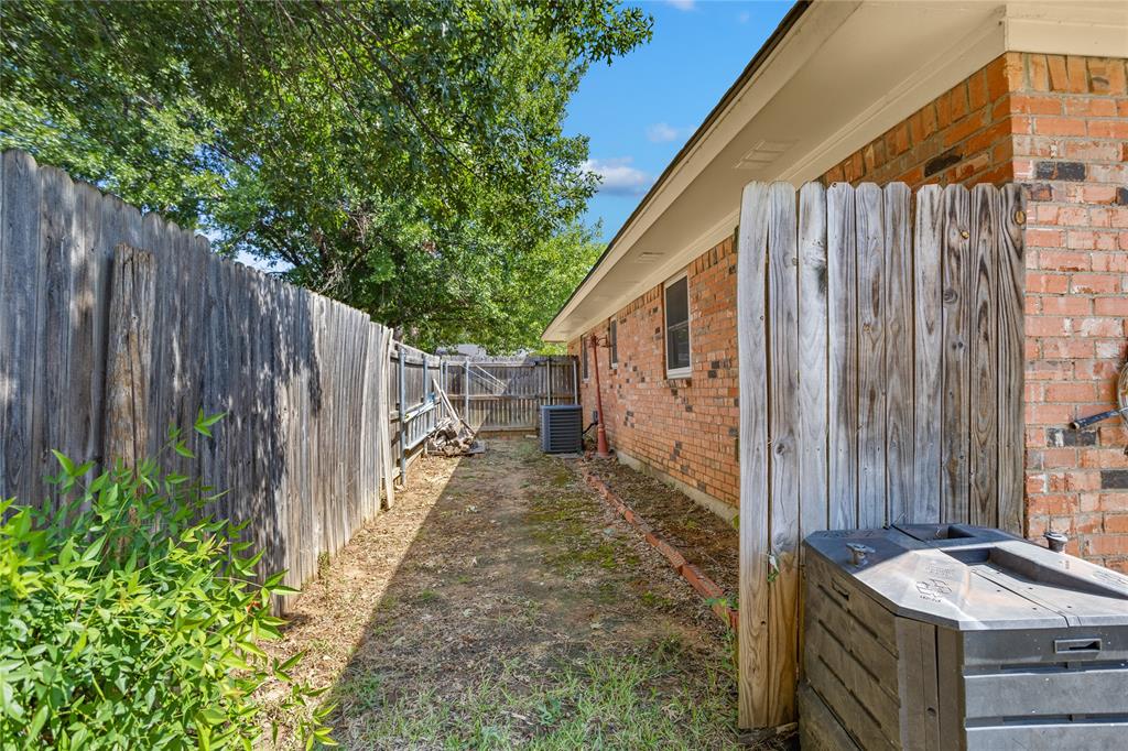 Brick exterior with wood fencing