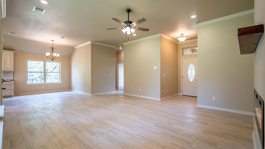 View from living room showing living, dining and front door