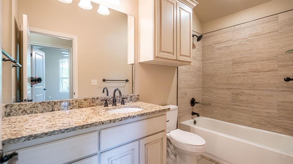 Secondary bathroom with shower tub combo