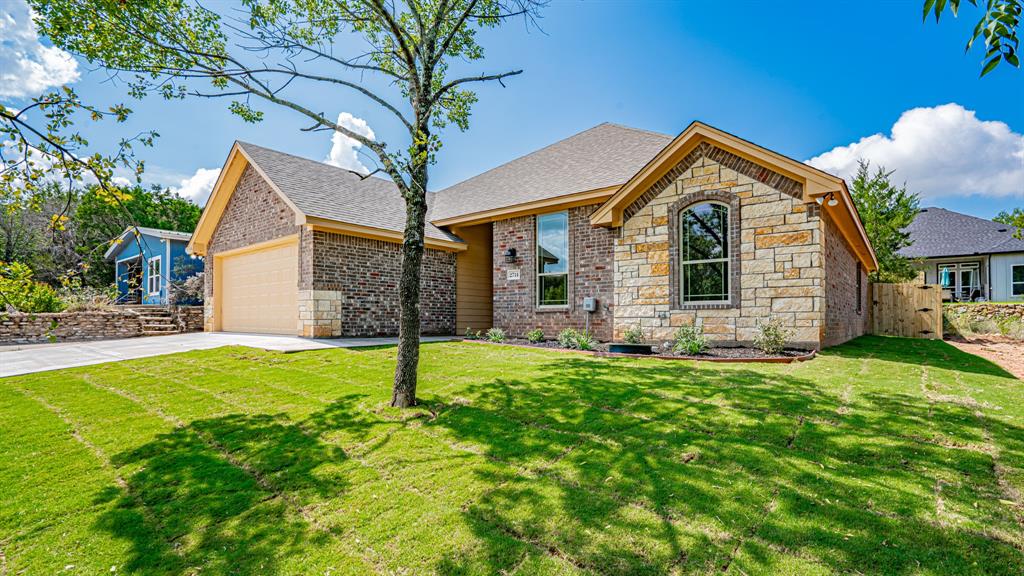 Brick and stone home with two car garage