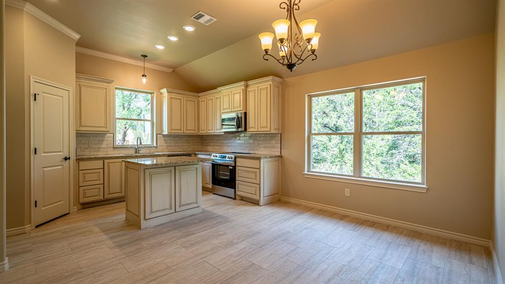 Kitchen with beautiful custom cabinets and center island