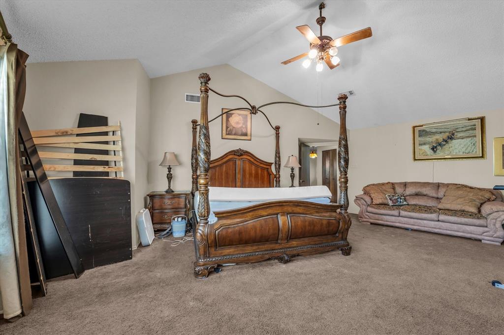 Vaulted ceiling with an attached ceiling fan