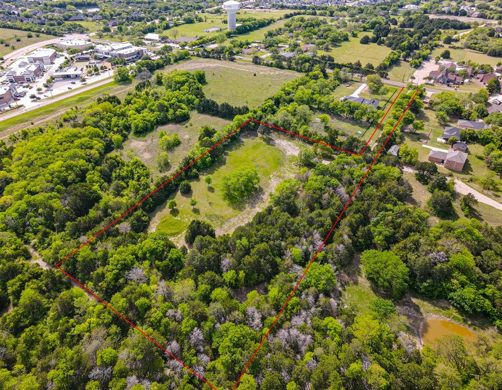 Expansive wooded property featuring mature trees, open green space, and natural landscape throughout Expansive wooded property featuring mature trees, open green space, and natural landscape throughout