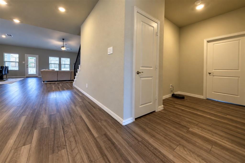Wood-finish flooring throughout the main level