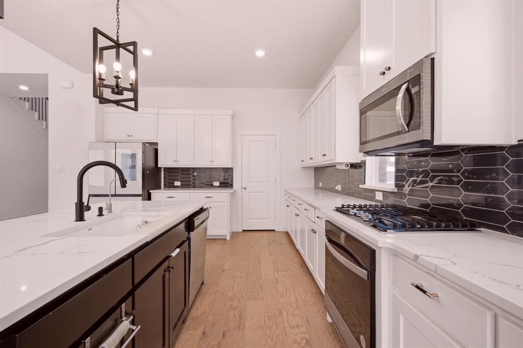 Large kitchen is the center of this home