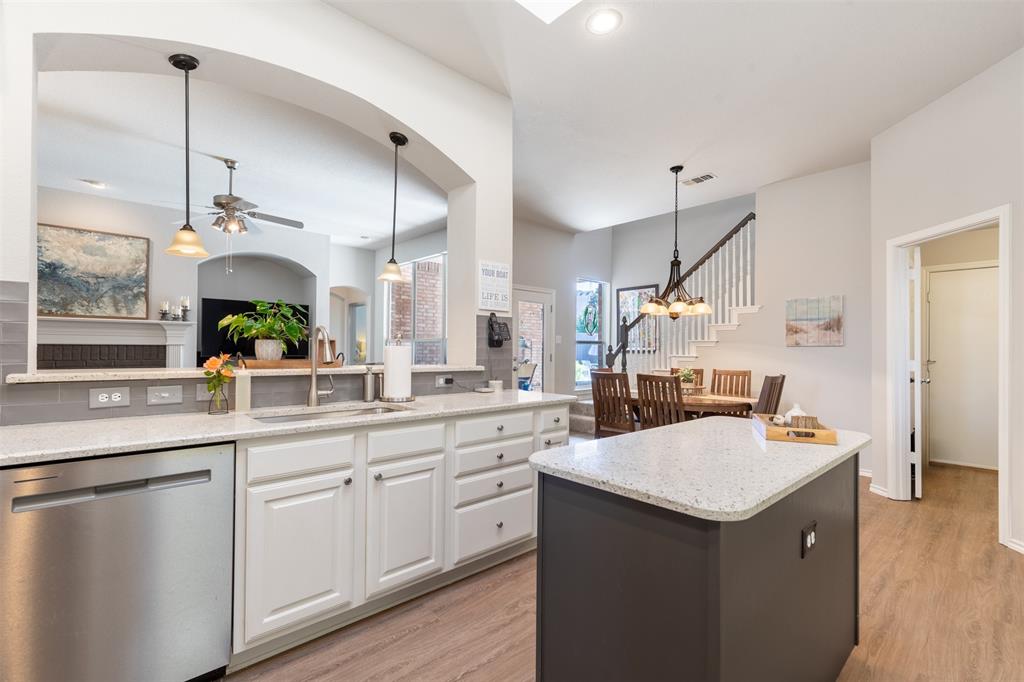 Kitchen with eat-in bar top. Kitchen with eat-in bar top.