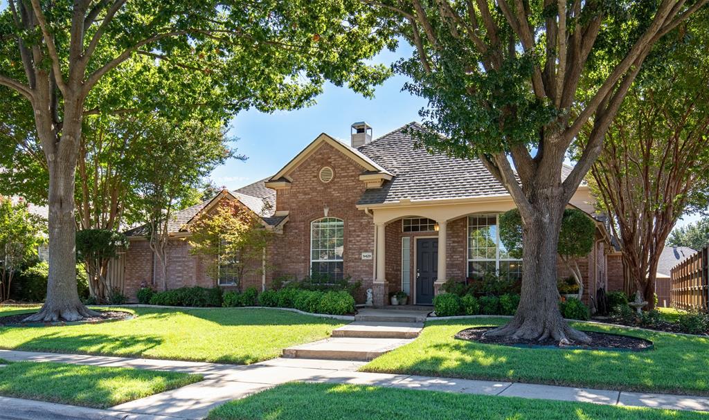 Beautiful curb appeal with mature trees, offering shade, and bordered lush landscaping. Beautiful curb appeal with mature trees, offering shade, and bordered lush landscaping.
