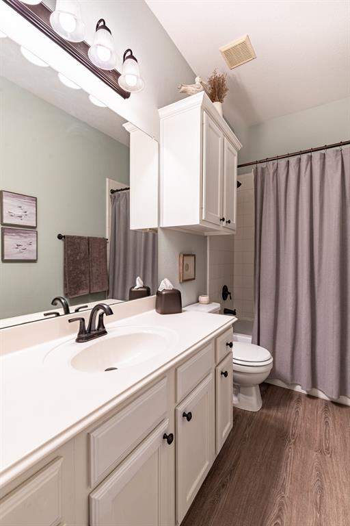 Secondary downstairs full bath.