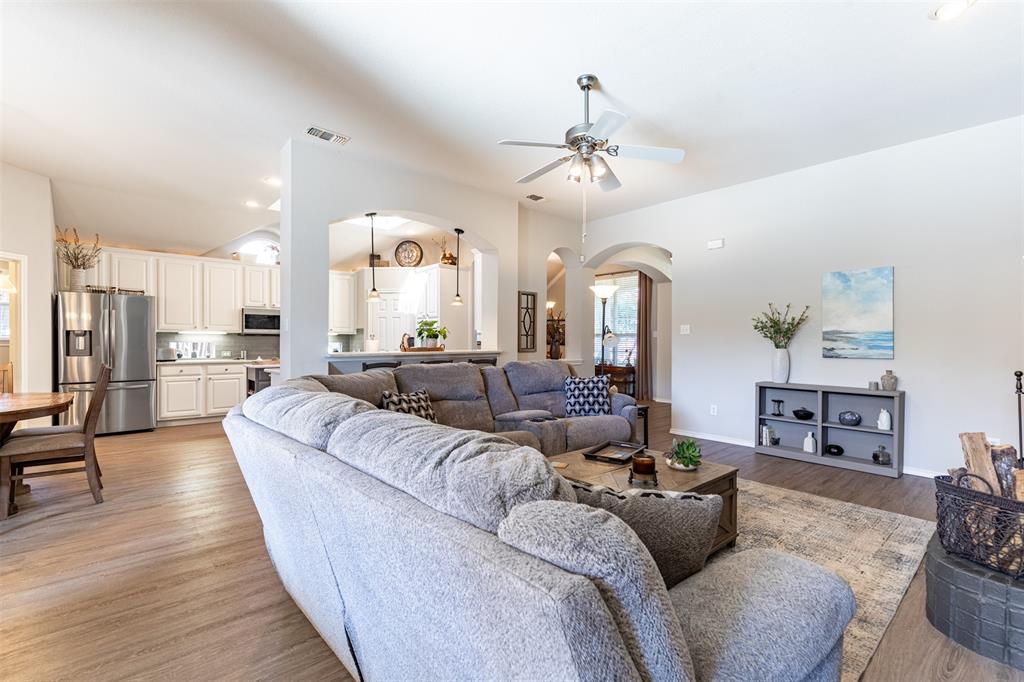 Open-concept living room to kitchen.